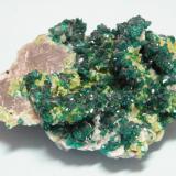 Dioptase, Calcite and Duftite<br />Tsumeb Mine, Tsumeb, Otjikoto Region, Namibia<br />68mm x 50mm x 34mm<br /> (Author: Heimo Hellwig)