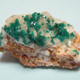 Dioptase on Calcite<br />Tsumeb Mine, Tsumeb, Otjikoto Region, Namibia<br />40mm x 26mm x 23mm<br /> (Author: Heimo Hellwig)