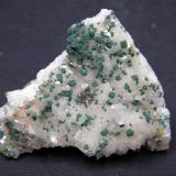Malachite on Calcite<br />Tsumeb Mine, Tsumeb, Otjikoto Region, Namibia<br />43mm x 32mm x 27mm<br /> (Author: Heimo Hellwig)