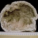 Calcite (variety manganese-rich) on Quartz<br />Sheffler's Geode Mine, St. Francisville, Clark County, Missouri, USA<br />large geode about 18 cm. The calcites are up to about 4.5 cm<br /> (Author: Bob Harman)