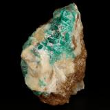 Beryl (variety emerald), Calcite<br />Peñas Blancas Mine, Municipio San Pablo de Borbur, Western Emerald Belt, Boyacá Department, Colombia<br />52x80x79mm, main xl=12mm<br /> (Author: Fiebre Verde)