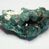 Dioptase<br />Tsumeb Mine, Tsumeb, Otjikoto Region, Namibia<br />53mm x 25mm x 40mm<br /> (Author: Heimo Hellwig)