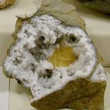 Baryte on Quartz<br />Mission Valley Ravine, Monroe County, Indiana, USA<br />nicely terminated 4.3 cm Baryte in 11 cm Quartz geode<br /> (Author: Bob Harman)