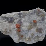 Rhodochrosite, Fluorapatite, AlbiteMina Foote Lithium Co. (Mina Foote), Distrito Kings Mountain, Condado Cleveland, North Carolina, USA7.6 x 5.1 cm (Author: am mizunaka)
