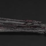 Kermesite<br />Kermesite occurrence, Damingshan Range, Dafeng, Shanglin, Nanning Prefecture, Guangxi Zhuang Autonomous Region, China<br />11.2 x 1.4 cm<br /> (Author: am mizunaka)