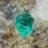 Beryl (variety emerald), Calcite, PyriteChivor (distrito minero), Municipio Chivor, Cinturón Esmeraldífero Oriental, Departamento Boyacá, Colombia30x27x21mm, xl=5mm (Author: Fiebre Verde)
