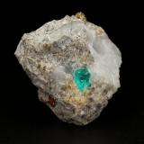 Beryl (variety emerald), Calcite, PyriteChivor (distrito minero), Municipio Chivor, Cinturón Esmeraldífero Oriental, Departamento Boyacá, Colombia30x27x21mm, xl=5mm (Author: Fiebre Verde)