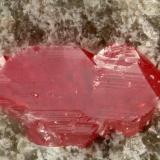 Cinnabar<br />Aetna Mine, Mayacmas Mountains, Aetna Springs, East Mayacmas District, Napa County, California, USA<br />FOV = 1.0 mm<br /> (Author: Doug)