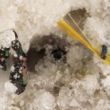 HolfertiteHolfertite pit, Starvation Canyon (Searles Canyon), Thomas Range, Juab County, Utah, USAFOV = 2.9 mm (Author: Doug)