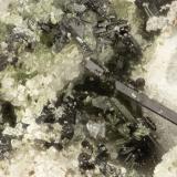 Aenigmatite<br />Taratimi Bay (Crater Bay), Mayor Island (Tuhua), New Zealand<br />FOV = 1.4 mm<br /> (Author: Doug)