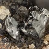 Hetaerolite<br />Mohawk Mine, Mohawk Hill, Clark Mountains, Clark Mountain District (Clark District), San Bernardino County, California, USA<br />FOV = 1.3 mm<br /> (Author: Doug)
