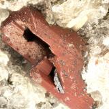 Enstatite, Hematite<br />Summit Rock, Klamath County, Oregon, USA<br />FOV = 1.9 mm<br /> (Author: Doug)