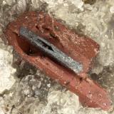 Enstatite, HematiteSummit Rock, Klamath County, Oregon, USAFOV = 1.9 mm (Author: Doug)