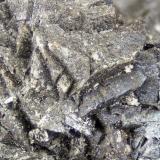 Cryptomelane<br />Poudrette Quarry, Mont Saint-Hilaire, La Vallée-du-Richelieu RCM, Montérégie, Québec, Canada<br />FOV = 4.0 mm<br /> (Author: Doug)