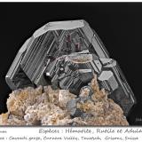 Rutile on Hematite and with Orthoclase (variety adular)Cavradi, Valle Curnera, Tujetsch (Tavetsch), Valle Vorderrhein, Grisones (Grischun; Graubünden), Suizafov 29 mm (Author: ploum)