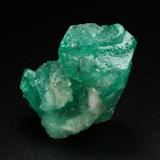 Beryl (variety emerald), Calcite<br />Coscuez mining district, Municipio San Pablo de Borbur, Western Emerald Belt, Boyacá Department, Colombia<br />27x21x20mm<br /> (Author: Fiebre Verde)