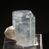 Beryl (variety aquamarine) and Quartz (variety smoky)<br />Erongo Region, Namibia<br />35mm x 37mm x 18mm overall size. Beryl = 24mm x 37mm x 18mm<br /> (Author: Firmo Espinar)