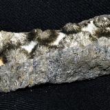 Millerite<br />Thompson Mine (Thompson open pit), Thompson, Winnipeg Capital Region, Manitoba, Canada<br />9x2x2 cm<br /> (Author: Joseph DOliveira)