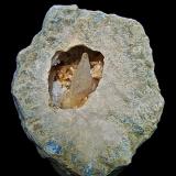 Calcite and Dolomite on Quartz<br />State Route 37 road cuts, Harrodsburg, Clear Creek Township, Monroe County, Indiana, USA<br />8.5 cm geode with a 5 cm cavity containing a 3.6 cm calcite surrounded by dolomite and quartz crystals<br /> (Author: Bob Harman)