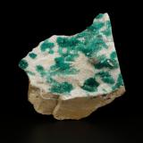 Beryl (variety emerald), Pyrite, Calcite, Albite (variety cleavelandite)<br />Chivor Mining District, Camoyo Mine, Municipio Chivor, Eastern Emerald Belt, Boyacá Department, Colombia<br />70x62x11mm, xls up to 8mm long<br /> (Author: Fiebre Verde)