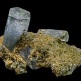 Beryl (variety aquamarine) with Muscovite<br />Bergsig Farm 167 (Hohenstein), Omaruru, Erongo Region, Namibia<br />30 x 20 x 20 mm<br /> (Author: Rob Schnerr)
