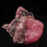 Rhodochrosite, ElbaitePederneira claim, São José da Safira, Governador Valadares, Vale do Rio Doce, Minas Gerais, Brazil21 x 23 mm (Author: am mizunaka)