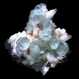 Fluorite on calciteShangbao Mine, Leiyang, Hengyang Prefecture, Hunan Province, ChinaSpecimen size 10,5 cm, largest fluorite crystals 2 cm (Author: Tobi)