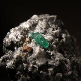 Beryl (variety emerald), Parisite and Calcite<br />Muzo mining district, Western Emerald Belt, Boyacá Department, Colombia<br />45mm x 42mm x 36mm<br /> (Author: Firmo Espinar)