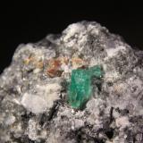 Beryl (variety emerald), Parisite and Calcite<br />Muzo mining district, Western Emerald Belt, Boyacá Department, Colombia<br />45mm x 42mm x 36mm<br /> (Author: Firmo Espinar)