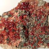 Grossular (variety hessonite), Diopside, Clinochlore<br />Bellecombe, Châtillon, Aosta Valley (Val d'Aosta), Italy<br />86 x 66 mm<br /> (Author: Sante Celiberti)