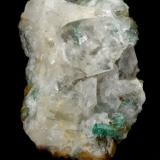 Beryl (variety emerald), Calcite, Fluorite<br />Peñas Blancas Mine, Municipio San Pablo de Borbur, Western Emerald Belt, Boyacá Department, Colombia<br />36mm x 17mm x 26mm, xl=6mm<br /> (Author: Fiebre Verde)