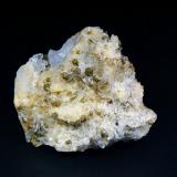 Cookeíta sobre CuarzoMina Stand-on-Your-Head No. 1, Bland, Saline County, Arkansas, USA6 x 6 cm (Autor: Antonio P. López)