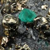 Beryl (variety emerald), Pyrite, Calcite<br />Chivor mining district, Municipio Chivor, Eastern Emerald Belt, Boyacá Department, Colombia<br />35mm x 38mm x 37mm, xl=5mm<br /> (Author: Fiebre Verde)