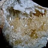 Calcite on Quartz<br />Lawrence County, Indiana, USA<br />Calcites to 2 cm in 6.5 cm geode<br /> (Author: Bob Harman)