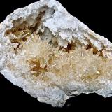 Calcite on Quartz<br />Lawrence County, Indiana, USA<br />Calcites to 2 cm in 6.5 cm geode<br /> (Author: Bob Harman)