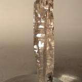 Quartz (smokey)<br />Miage Glacier, Veny Valley, Monte Bianco Massif (Mont Blanc Massif), Courmayeur, Aosta Valley (Val d'Aosta), Italy<br />73 x 16 mm<br /> (Author: Sante Celiberti)