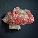 Rhodochrosite<br />Wutong Mine, Liubao, Cangwu, Wuzhou Prefecture, Guangxi Zhuang Autonomous Region, China<br />57 mm x 38 mm x 25 mm<br /> (Author: Don Lum)