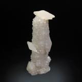 Calcite on quartz<br />Cavnic mining area, Cavnic, Maramures, Romania<br />2.2 cm x 5.7 cm.<br /> (Author: Michael Shaw)