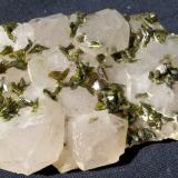 Epidote on quartz<br />Meigu, Liangshan Autonomous Prefecture, Sichuan Province, China<br />6 x 4 cm<br /> (Author: Volkmar Stingl)
