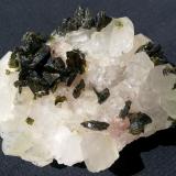 Epidote on Quartz<br />Meigu, Liangshan Autonomous Prefecture, Sichuan Province, China<br />8 x 5 cm<br /> (Author: Volkmar Stingl)
