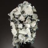 Calcite on Stibnite<br />Herja Mine, Chiuzbaia, Baia Sprie, Maramures, Romania<br />3.5 cm x 7.0 cm<br /> (Author: Michael Shaw)