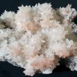 Calcite on Quartz (variety smoky)<br />Daye mining area, Edong, Daye, Huangshi Prefecture, Hubei Province, China<br />16 x 10<br /> (Author: Volkmar Stingl)