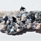 Hematite and Calcite<br />N'Chwaning mining area, Kuruman, Kalahari manganese field (KMF), Northern Cape Province, South Africa<br />60mm  X 40mm X 20mm<br /> (Author: Philippe Durand)