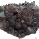 Cuarzo (variedad amatista)<br />Cantera del Vértice, Cerro Vértice, Villaviciosa de Córdoba, Comarca Valle del Guadiato, Córdoba, Andalucía, España<br />12 x 9 cm<br /> (Autor: Joan Niella)