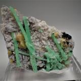 Beryl (variety emerald), Scheelite, Feldspar<br />Dayakou Mine, Mengdong township, Malipo, Wenshan Zhuang and Miao Autonomous Prefecture, Yunnan Province, China<br />65 mm x 47 mm x 13 mm<br /> (Author: Don Lum)