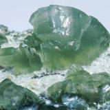 Prehnite with Albite and EpidoteLa Combe de la Selle, Saint-Christophe-en-Oisans, Le Bourg d'Oisans Comune, Isère, Auvergne-Rhône-Alpes, FranceSpecimen size: 4.3 × 3.4 × 2.9 cm / main crystal size: 1.2 × 1 cm (Author: Jordi Fabre)