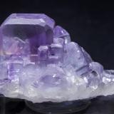 Fluorite<br />Llamas Quarry, Obdulia vein, Caravia mining area, Las Cabañas, Duyos, Caravia, Comarca Oriente, Principality of Asturias (Asturias), Spain<br />Specimen size: 3.6 × 3 × 2.8 cm /  main crystal size: 1.5 × 1 cm<br /> (Author: Jordi Fabre)