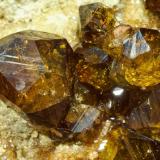 Andradite (variety topazolite)<br />Antetezambato outcrop, Antetezambato, Maherivaratra Commune, Ambanja District, Antsiranana Province, Madagascar<br />Crystal size: 1.6 × 1.2 cm<br /> (Author: Jordi Fabre)