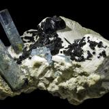 Beryl (variety aquamarine) with Schorl and Orthoclase<br />Bergsig Farm 167 (Hohenstein), Omaruru, Erongo Region, Namibia<br />80 x 60 x 55 mm<br /> (Author: Rob Schnerr)