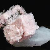 Rhodochrosite with Quartz and Arsenopyrite<br />Cassandra Mines, Chalkidiki Prefecture, Macedonia Department, Greece<br />Specimen size: 6.4 × 4.6 × 4.4 cm / main crystal size: 3.3 × 2.6 cm<br /> (Author: Jordi Fabre)